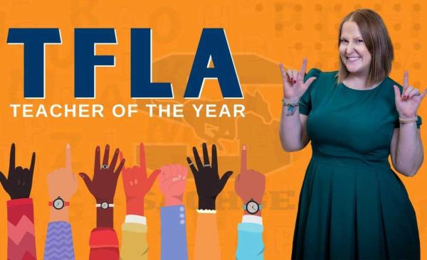 ASL Teacher of the year in a green dress standing next to text that reads T.F.L.A. - Teacher of the Year
