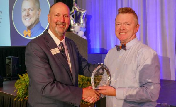 John Murray, Sachse English Teacher, receives Teacher of the Year award at Region 10