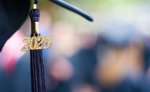 2025 tassel hangs off a graduation cap