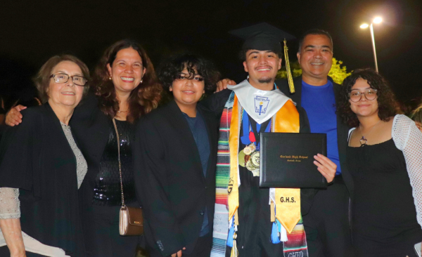 Sebastian Perez graduates surrounded by his family