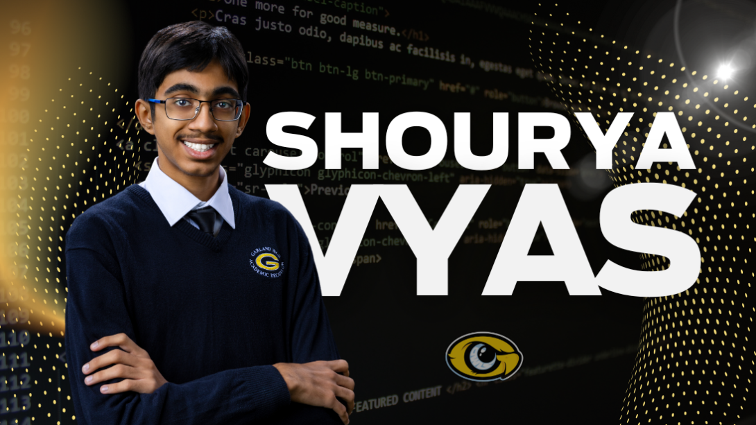 Shourya Vyas stands with arms folded and his name in big letters in the background