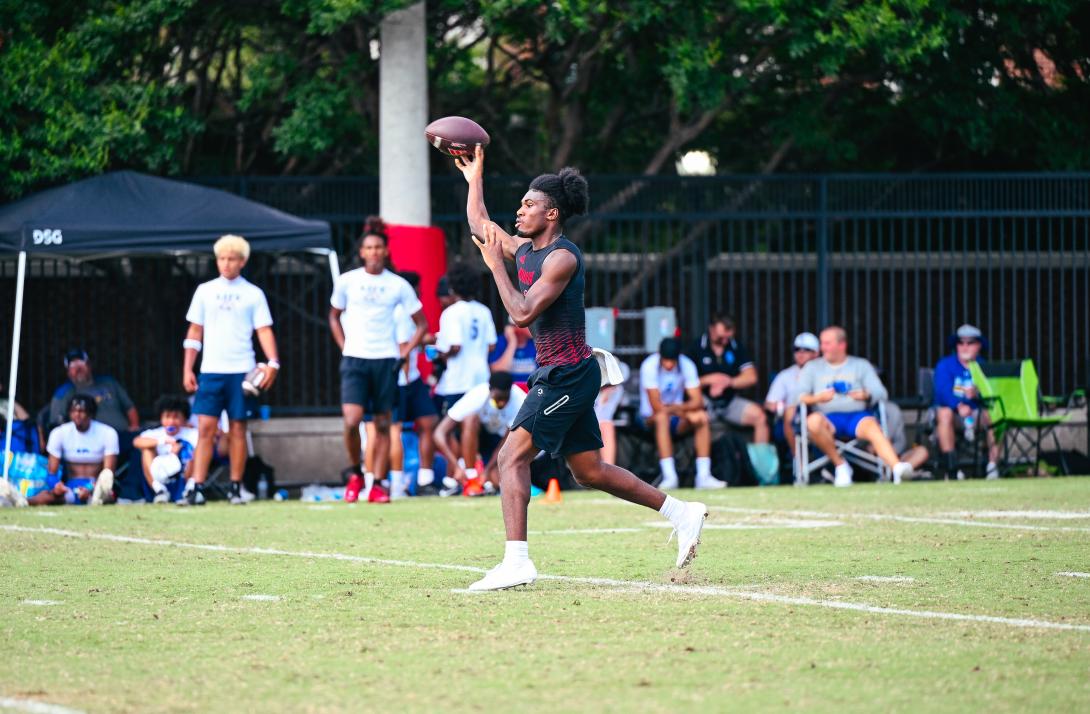 Football player prepares to throw the football