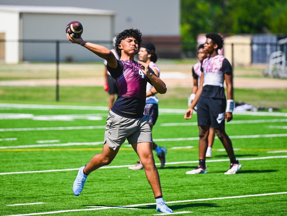 Football player prepares to throw the football