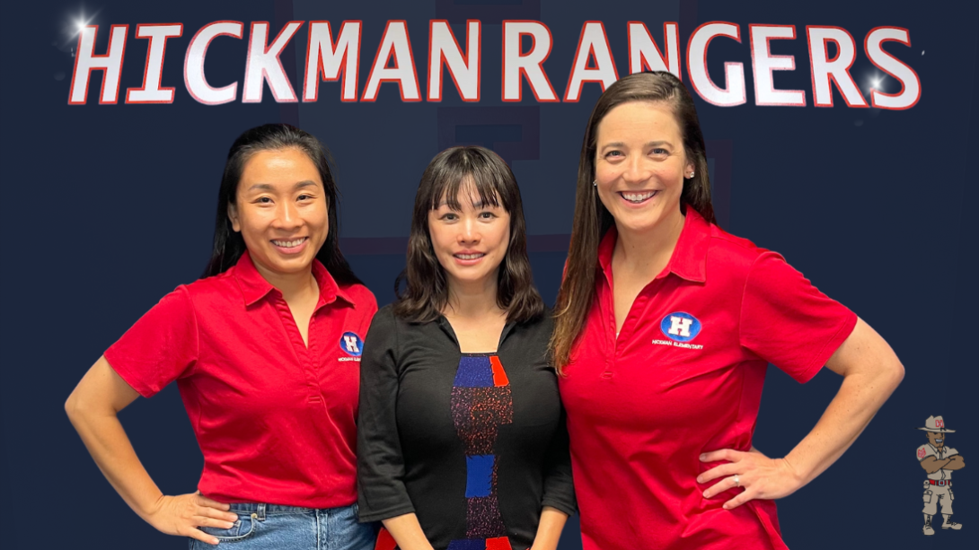 Three woman stand smiling with the words "Hickman Rangers" behind them