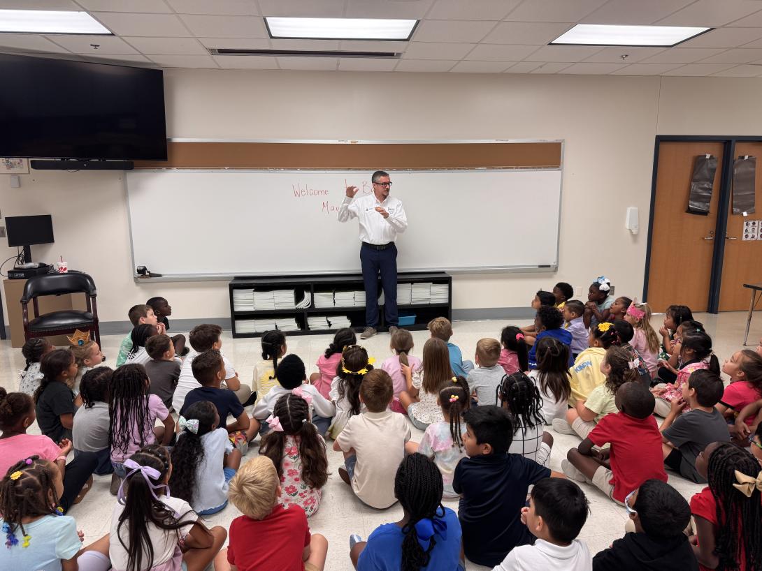 Rowlett Mayor speaks to a group of young students