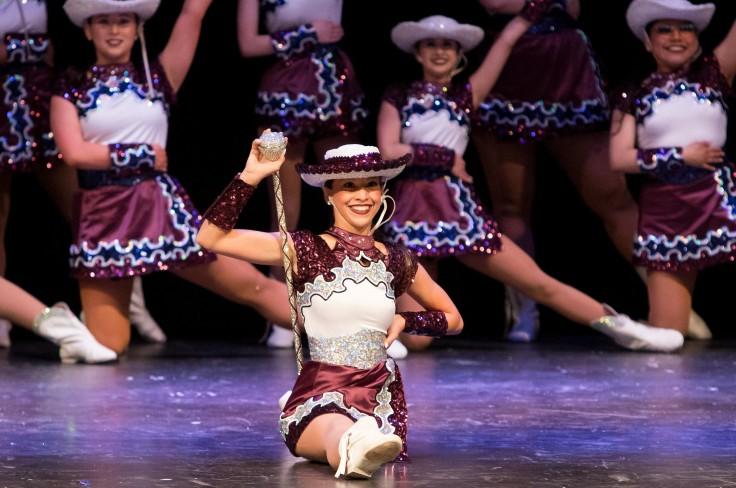 Drill team member doing splits