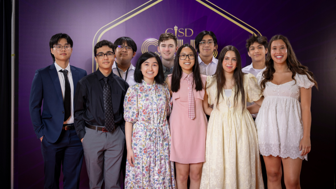 a diverse group of students stand in front of a purple background