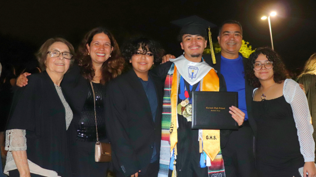 Sebastian Perez graduates surrounded by his family